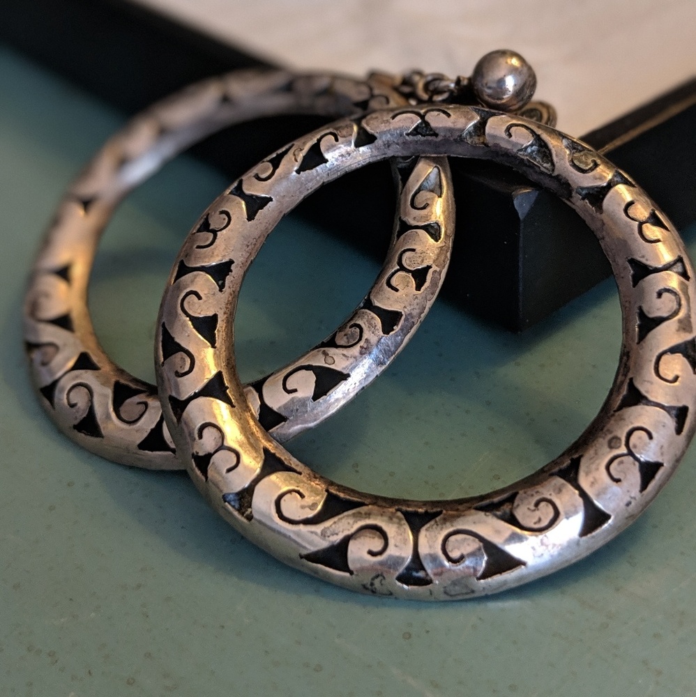 Silver handcrafted un-pierced earrings